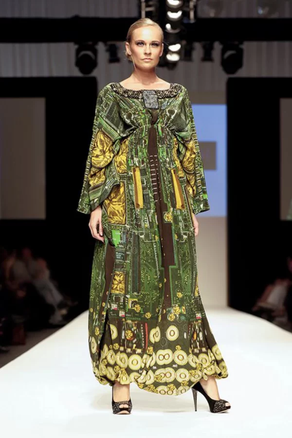 This long sleeve Modest kaftan was shown in Dubai fashion week. The print was inspired from a Blackberry smart phone mother board and its components and Swarovski crystallized elements digitally made for the collection.
