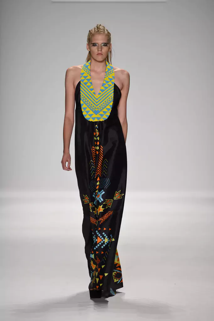 Hand-beaded long luxury resort wear geometric tribal prints and patterns of dress worn by a model shown on the runway of mercedes benz new york fashion week